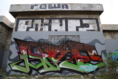 Light Green and Red Stylewriting by Moosem135. This Graffiti is located in Baku, Azerbaijan and was created in 2017. This Graffiti can be described as Stylewriting and Abandoned.