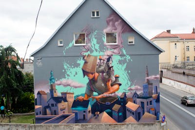 Cyan and Grey and Coralle Characters by Fat Heat. This Graffiti is located in Chelmno, Poland and was created in 2019. This Graffiti can be described as Characters, Streetart, Murals and Commission.
