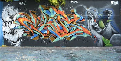 Orange and Cyan and Colorful Stylewriting by CDSK, Chips, DavePlant and This One. This Graffiti is located in London, United Kingdom and was created in 2023. This Graffiti can be described as Stylewriting, Characters, Streetart and Wall of Fame.