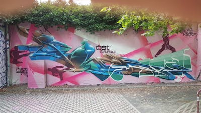 Colorful Stylewriting by urine, Köter and OST. This Graffiti is located in Leipzig, Germany and was created in 2019. This Graffiti can be described as Stylewriting, Handstyles, Wall of Fame, Futuristic and Characters.