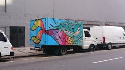 Colorful Characters by unknown. This Graffiti is located in Rio de Janeiro, Brazil and was created in 2016. This Graffiti can be described as Characters and Cars.