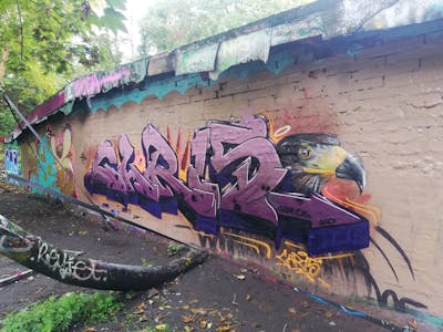 Colorful Stylewriting by Chr15 and bos. This Graffiti is located in Leipzig, Germany and was created in 2022. This Graffiti can be described as Stylewriting, Wall of Fame and Characters.