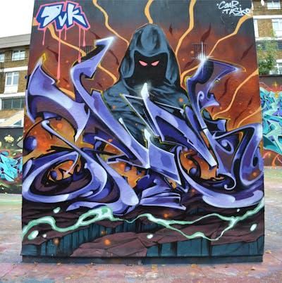 Violet and Orange and Colorful Stylewriting by CDSK and Chips. This Graffiti is located in London, United Kingdom and was created in 2023. This Graffiti can be described as Stylewriting, Characters and Wall of Fame.