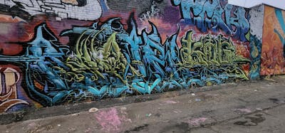Cyan and Colorful Stylewriting by Natrl. This Graffiti is located in United States and was created in 2023. This Graffiti can be described as Stylewriting and Wall of Fame.