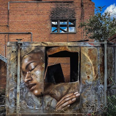Gold and Brown Characters by liambononi. This Graffiti is located in Liverpool, United Kingdom and was created in 2022. This Graffiti can be described as Characters, Murals and Abandoned.
