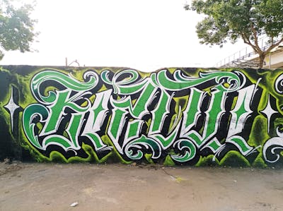 Green and Colorful Stylewriting by Bizcui. This Graffiti is located in Sevilla, Spain and was created in 2021. This Graffiti can be described as Stylewriting, Handstyles and Wall of Fame.