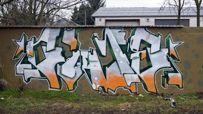 White and Orange and Green Stylewriting by Cime. This Graffiti is located in Budapest, Hungary and was created in 2018.