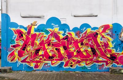 Red and Colorful Stylewriting by SEWER. This Graffiti is located in Würzburg, Germany and was created in 2019. This Graffiti can be described as Stylewriting and Wall of Fame.