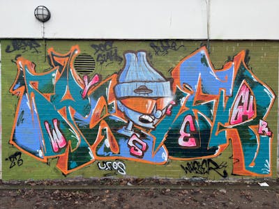 Orange and Light Blue and Cyan Stylewriting by Vysier64. This Graffiti is located in Hamburg, Germany and was created in 2023. This Graffiti can be described as Stylewriting and Characters.