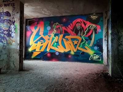Orange and Cyan and Red Stylewriting by Skur.ill and the Buddys. This Graffiti is located in Germany and was created in 2024. This Graffiti can be described as Stylewriting, Characters and Abandoned.