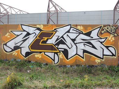 Brown and Chrome Stylewriting by News. This Graffiti is located in Eindhoven, Netherlands and was created in 2014. This Graffiti can be described as Stylewriting and Wall of Fame.