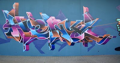 Coralle and Light Blue Stylewriting by Heny and Alfa crew. This Graffiti is located in Antwerp, Belgium and was created in 2022. This Graffiti can be described as Stylewriting and Wall of Fame.