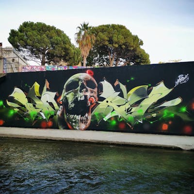 Light Green and Colorful Stylewriting by Norm. This Graffiti is located in Marseille, France and was created in 2020. This Graffiti can be described as Stylewriting and Characters.