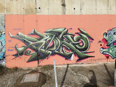 Green and Violet and Orange Stylewriting by Foko127, HC, ISC and LDK. This Graffiti is located in Napoli, Italy and was created in 2022. This Graffiti can be described as Stylewriting and Abandoned.