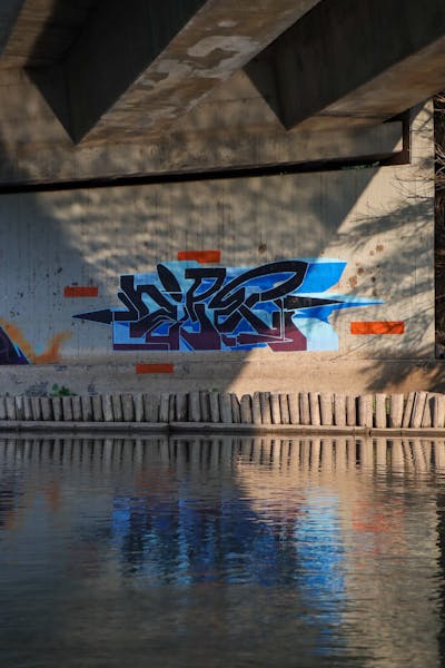 Light Blue and Black Stylewriting by Zire. This Graffiti is located in Israel and was created in 2023. This Graffiti can be described as Stylewriting and Atmosphere.