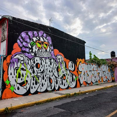 Chrome and Orange Stylewriting by Giusseppe. This Graffiti is located in CDMX, Mexico and was created in 2022. This Graffiti can be described as Stylewriting and Street Bombing.