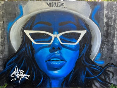 Blue and Grey Characters by Viruz. This Graffiti is located in Hamburg, Germany and was created in 2022.