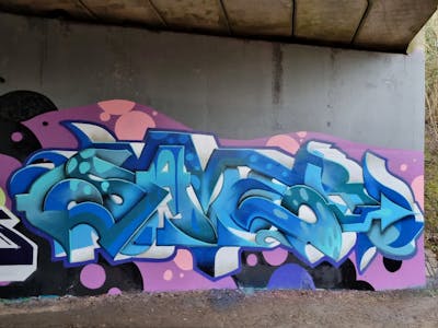 Coralle and White and Light Blue Stylewriting by Samer. This Graffiti is located in United Kingdom and was created in 2023.