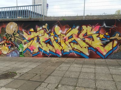 Yellow and Colorful Stylewriting by Trias. This Graffiti is located in Germany and was created in 2022. This Graffiti can be described as Stylewriting, Characters and Wall of Fame.