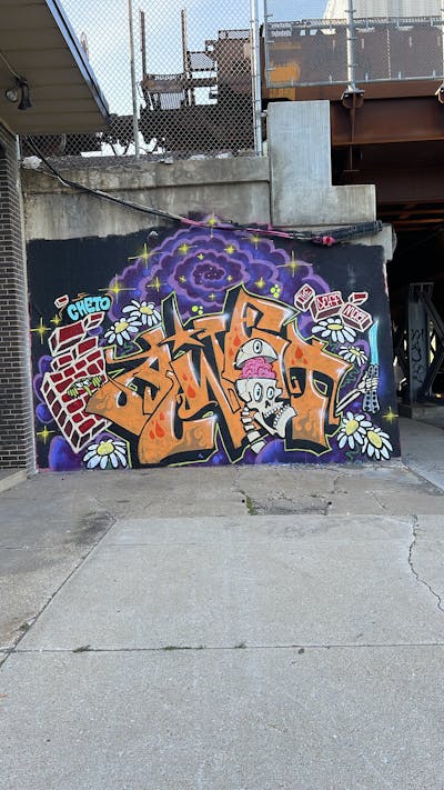 Orange and Colorful Characters by ALWET. This Graffiti is located in Chicago, United States and was created in 2022. This Graffiti can be described as Characters and Stylewriting.