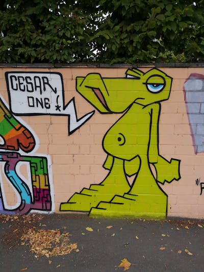 Colorful Characters by CesarOne.SNC. This Graffiti is located in Wiesbaden, Germany and was created in 2018. This Graffiti can be described as Characters and Wall of Fame.