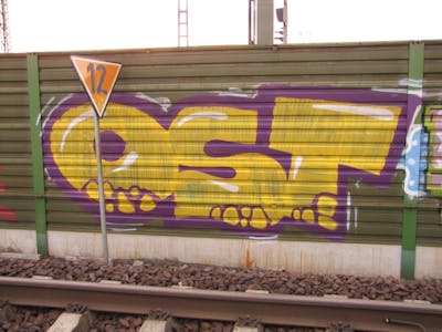 Yellow and Violet Stylewriting by urine, Pizar and OST. This Graffiti is located in Leipzig, Germany and was created in 2010. This Graffiti can be described as Stylewriting and Line Bombing.