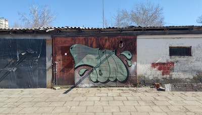 Light Green Throw Up by 7AM. This Graffiti is located in Novi Sad, Serbia and was created in 2023. This Graffiti can be described as Throw Up, Street Bombing and Atmosphere.