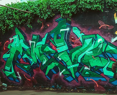 Green and Red Stylewriting by Nevs. This Graffiti is located in Philippines and was created in 2022.
