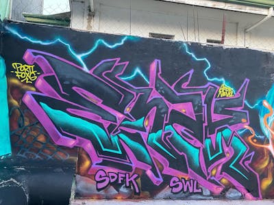 Violet and Colorful Stylewriting by Enzy1, SDFK and SWL. This Graffiti is located in Philippines and was created in 2024.