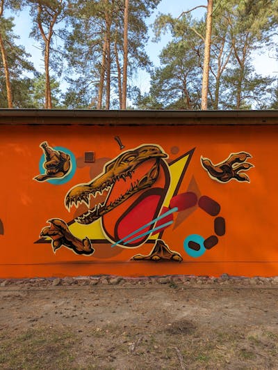 Orange and Yellow and Colorful Characters by Cami_ffc. This Graffiti is located in Arendsee, Germany and was created in 2023.