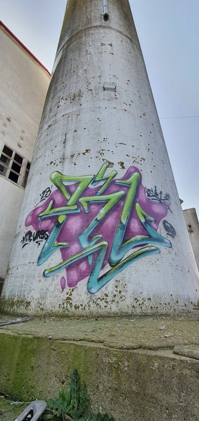 Cyan and Violet and Light Green Stylewriting by fil, graffdinamics, mtr and urbansoldierz. This Graffiti is located in Lleida, Spain and was created in 2023. This Graffiti can be described as Stylewriting and Abandoned.