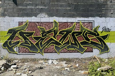 Yellow and Brown and Black Stylewriting by News. This Graffiti is located in Walbrzych, Poland and was created in 2023. This Graffiti can be described as Stylewriting and Characters.
