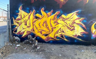 Yellow and Red and Blue Stylewriting by Sloke. This Graffiti is located in El Paso, United States and was created in 2022.