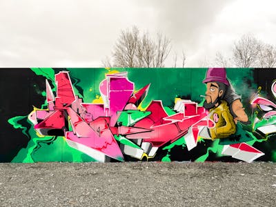 Colorful and Light Green and Red Stylewriting by Rowdy. This Graffiti is located in Leipzig, Germany and was created in 2023. This Graffiti can be described as Stylewriting and Characters.