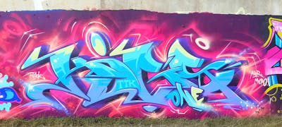 Light Blue and Colorful Stylewriting by Kigs One and TTK. This Graffiti is located in Newcastle upon Tyne, United Kingdom and was created in 2022. This Graffiti can be described as Stylewriting and Wall of Fame.