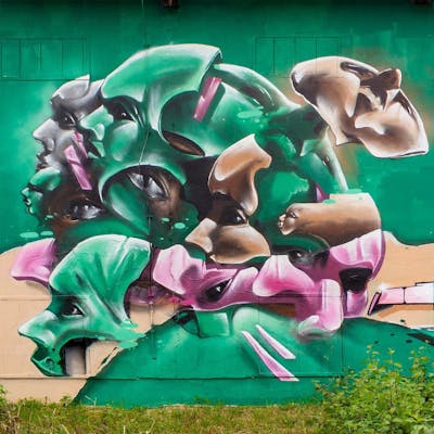 Beige and Light Green and Coralle Murals by byrdo. This Graffiti is located in Radebeul, Germany and was created in 2022. This Graffiti can be described as Murals, Special and Stylewriting.