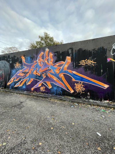 Orange and Colorful Stylewriting by Abik. This Graffiti is located in Hamburg, Germany and was created in 2021. This Graffiti can be described as Stylewriting and Wall of Fame.