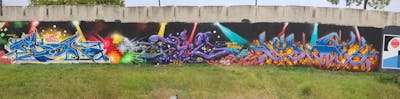 Colorful Stylewriting by fil, sik and EMAK. This Graffiti is located in Barcelona, Spain and was created in 2022. This Graffiti can be described as Stylewriting and Wall of Fame.