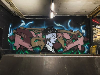 Coralle and Brown and Light Green Stylewriting by Safi. This Graffiti is located in Germany and was created in 2023. This Graffiti can be described as Stylewriting and Characters.