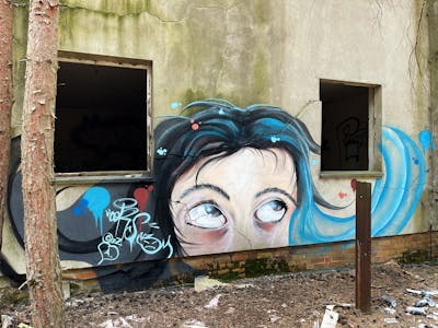 Colorful Characters by Cors One. This Graffiti is located in Berlin, Germany and was created in 2022. This Graffiti can be described as Characters and Abandoned.