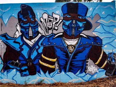 Light Blue Characters by RAEK. This Graffiti is located in Perth, Australia and was created in 2022.
