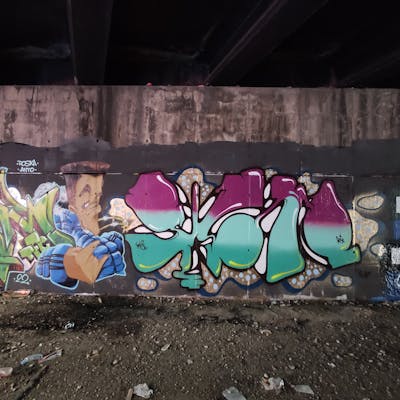Colorful Stylewriting by NKS and RIKAMS. This Graffiti is located in madrid, Spain and was created in 2022. This Graffiti can be described as Stylewriting, Characters and Abandoned.