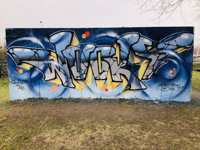 Blue and Yellow Stylewriting by WOOKY. This Graffiti is located in Potsdam, Germany and was created in 2022.