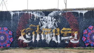Grey and Yellow Characters by TWC, bires382, Chaos and Sowe. This Graffiti is located in Toledo, Spain and was created in 2021. This Graffiti can be described as Characters, Handstyles, Wall of Fame and Murals.