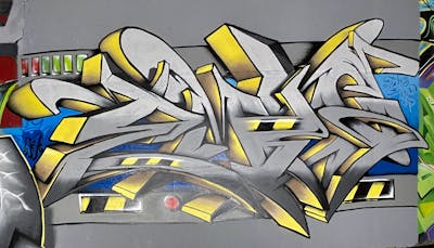 Grey and Yellow Stylewriting by EmzG. This Graffiti is located in Zug, Switzerland and was created in 2022.