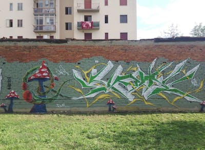 Light Green and Colorful Stylewriting by Kote and Log. This Graffiti is located in Prato, Italy and was created in 2022. This Graffiti can be described as Stylewriting and Characters.