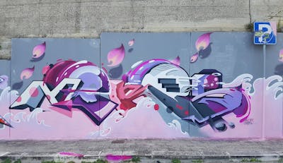 Violet and Coralle Stylewriting by Nekos. This Graffiti is located in Italy and was created in 2018. This Graffiti can be described as Stylewriting and Wall of Fame.