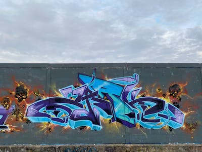 Orange and Light Blue and Violet Stylewriting by ZARK ONER. This Graffiti is located in Bologna, Italy and was created in 2022. This Graffiti can be described as Stylewriting and Characters.