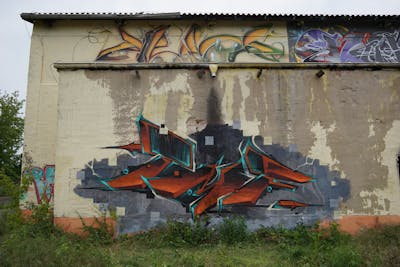 Colorful Stylewriting by Kan and TMF. This Graffiti is located in Weimar, Germany and was created in 2020. This Graffiti can be described as Stylewriting and Abandoned.