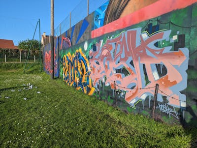 Colorful Stylewriting by LORD, Dock and Kosh. This Graffiti is located in Caen, France and was created in 2023. This Graffiti can be described as Stylewriting and Wall of Fame.